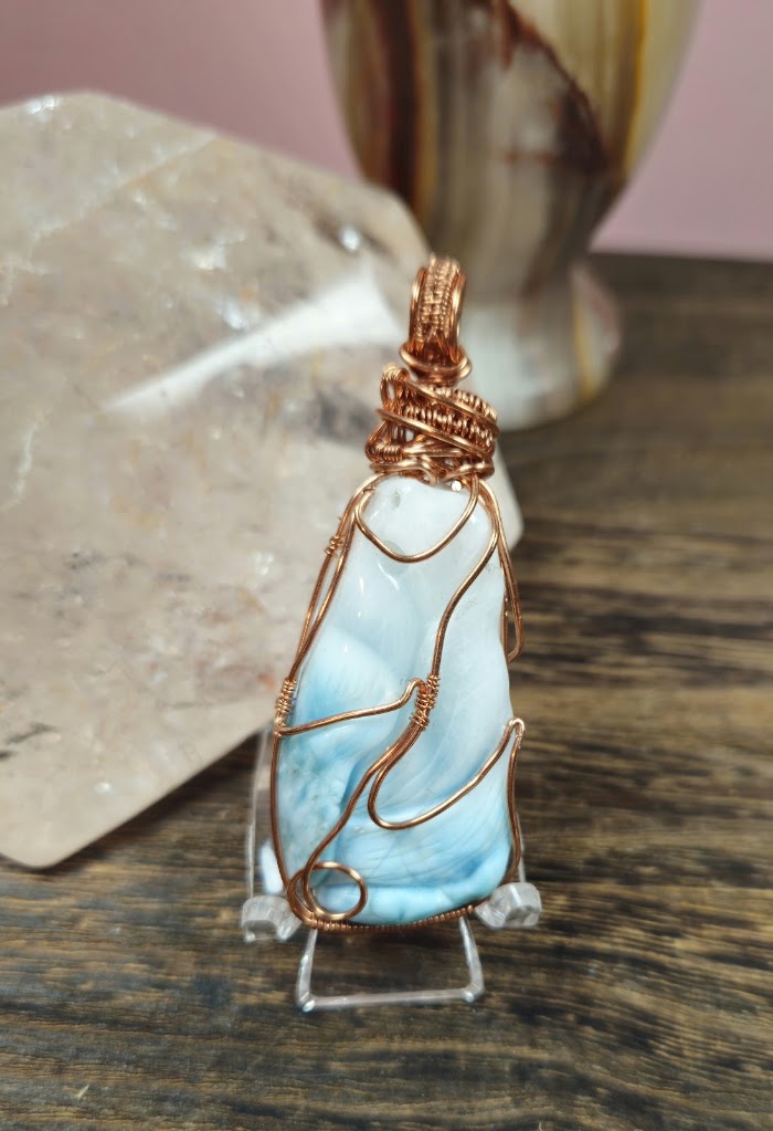 Double sided Larimar 9 tail fox.